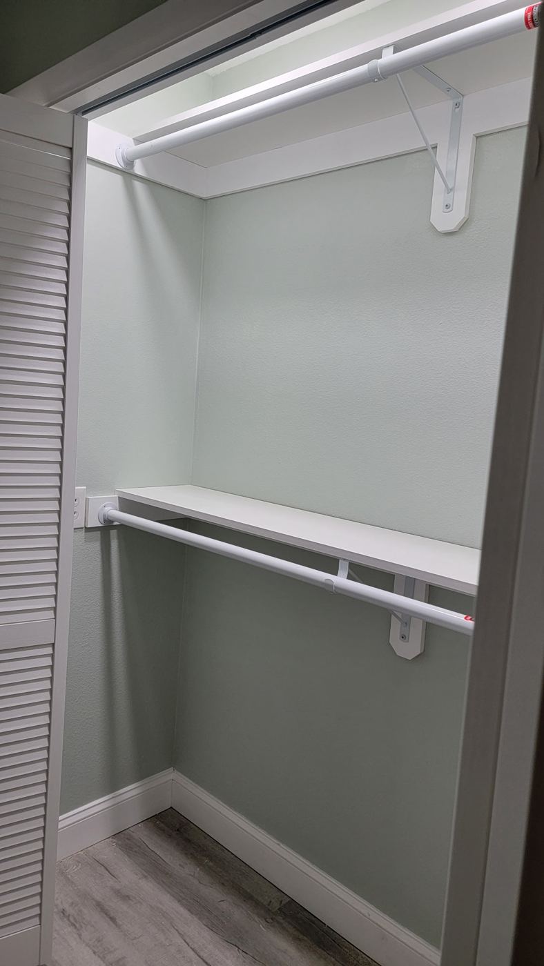 Closet with new double-hang shelving and rods