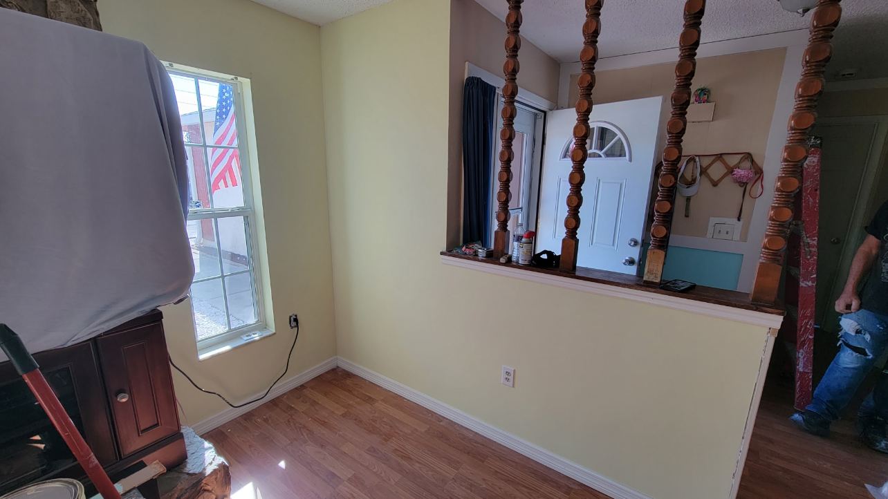 Same half wall finished with new trim and paint