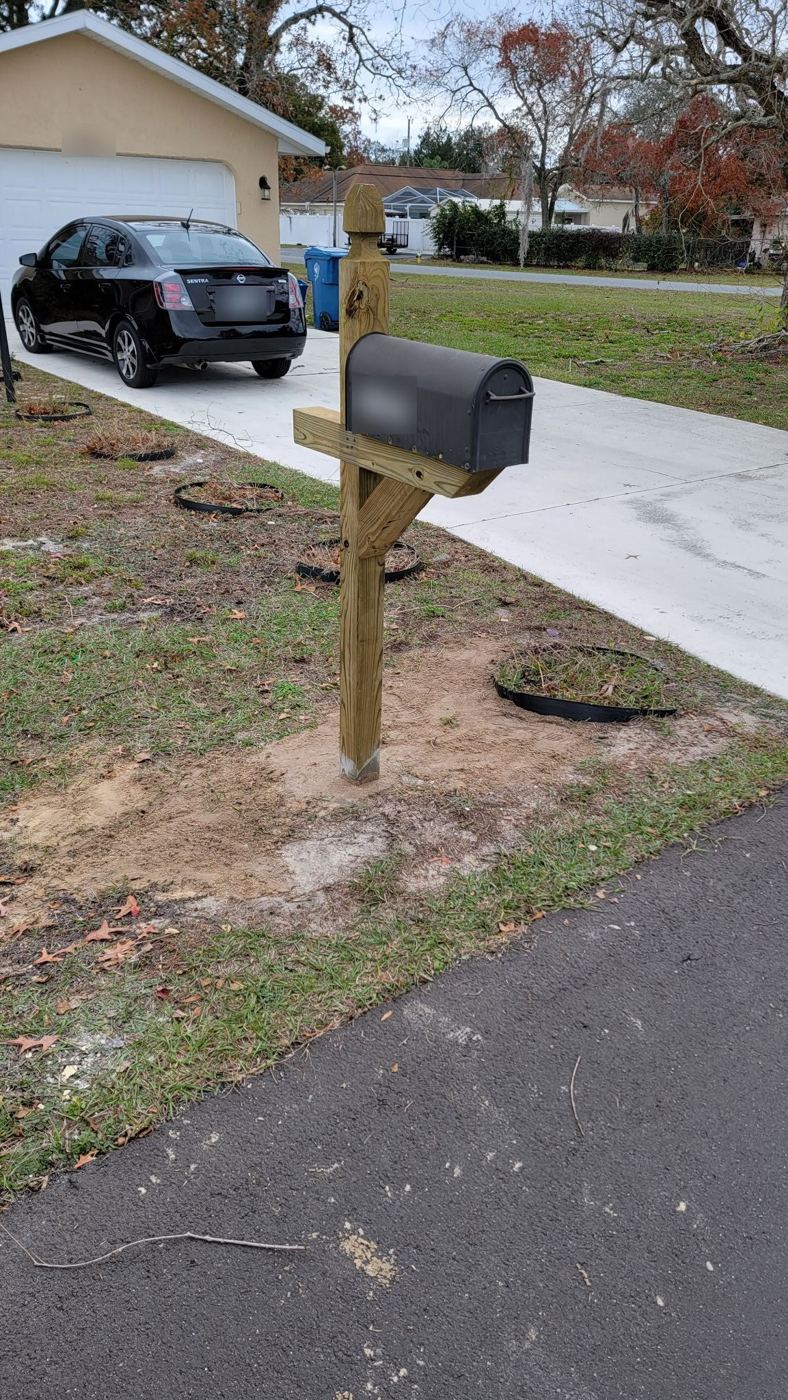 New wooden mailbox post with mailbox